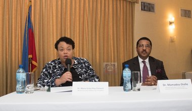 La Ministre a.i de la Planification et de la Coopération Externe, le Dr Marie Greta Roy Clément, et le Coordonnateur résident des Nations Unies en Haïti, le Dr Mamadou Diallo, lors de leur intervention. © MPCE